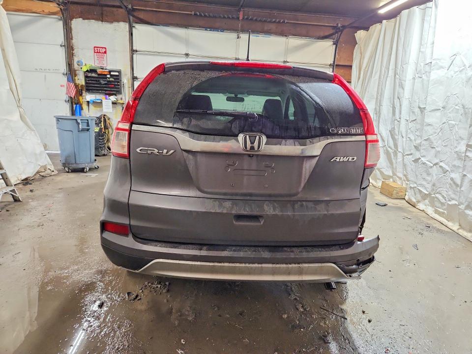 Photo 6 from auction – 2015 HONDA CR-V EX with VIN 2HKRM4H58FH692085
