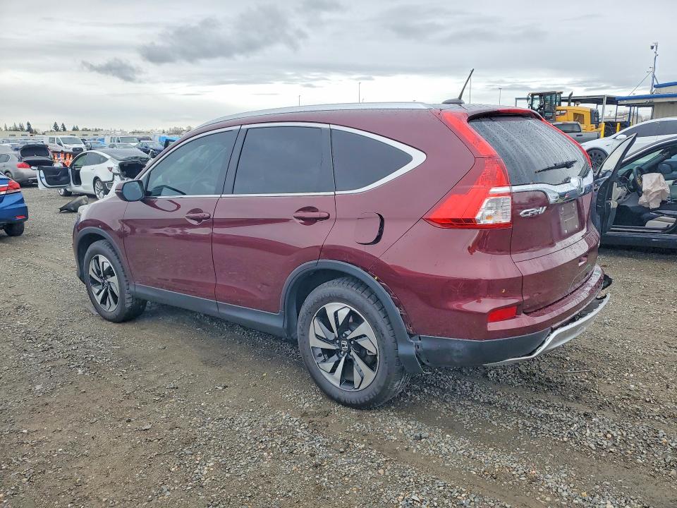 Photo 2 from auction – 2015 HONDA CR-V TOURI with VIN 5J6RM3H97FL014009