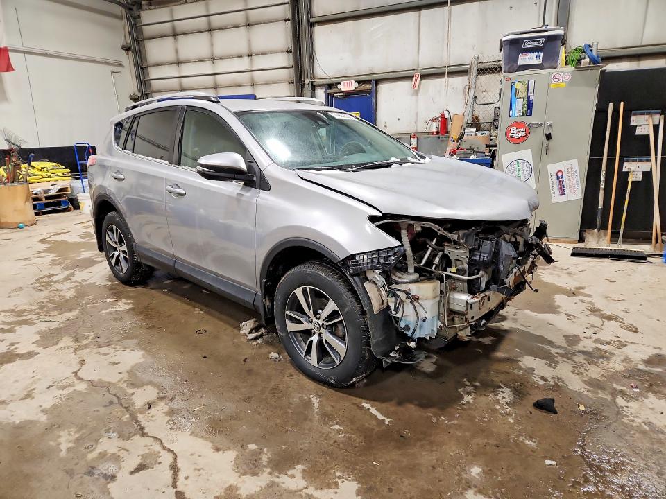 Photo 4 from auction – 2018 TOYOTA RAV4 LE with VIN 2T3BFREV7JW728007