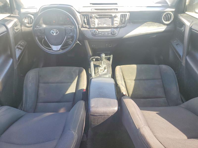 Photo 8 from auction – 2017 TOYOTA RAV4 XLE with VIN JTMWFREV2HD094906