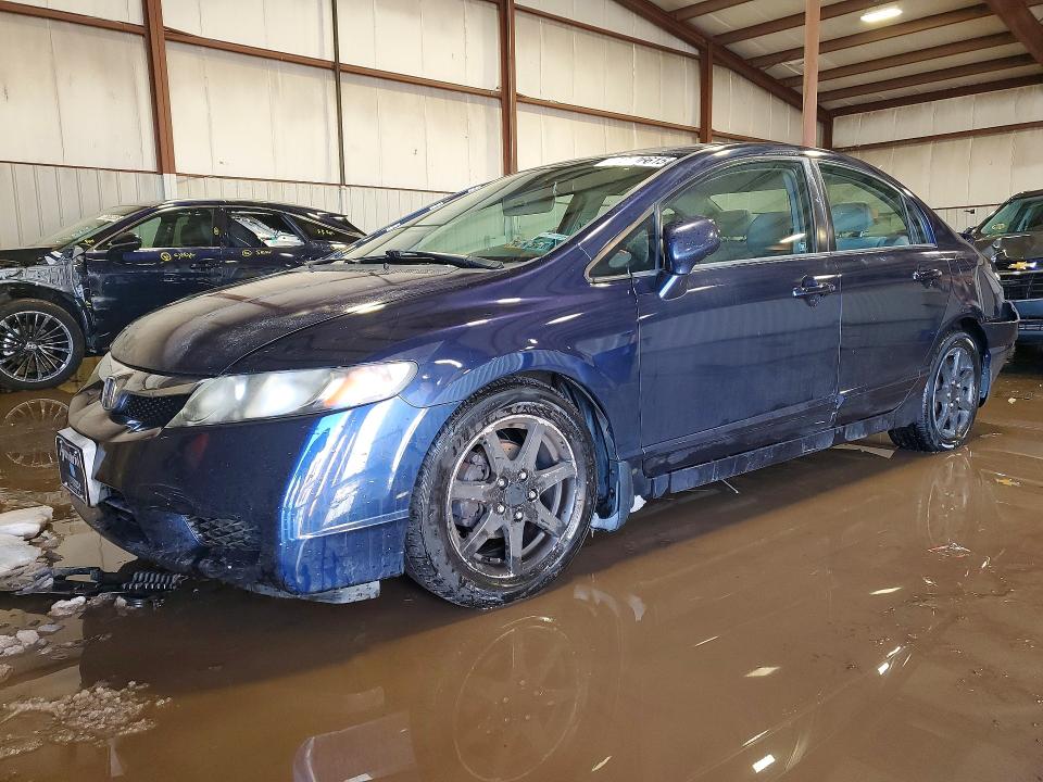 HONDA CIVIC LX 2011 with VIN 2HGFA1F54BH542217 - Photo from auction