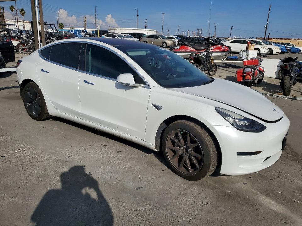 Photo 4 from auction – 2018 TESLA MODEL 3 with VIN 5YJ3E1EA5JF023329