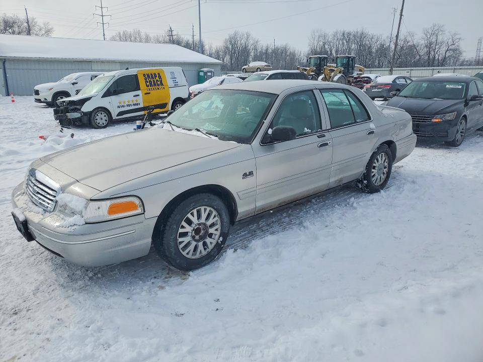 FORD CROWN VICTORIA 2004 with VIN 2FAFP74W54X129751 - Photo from auction