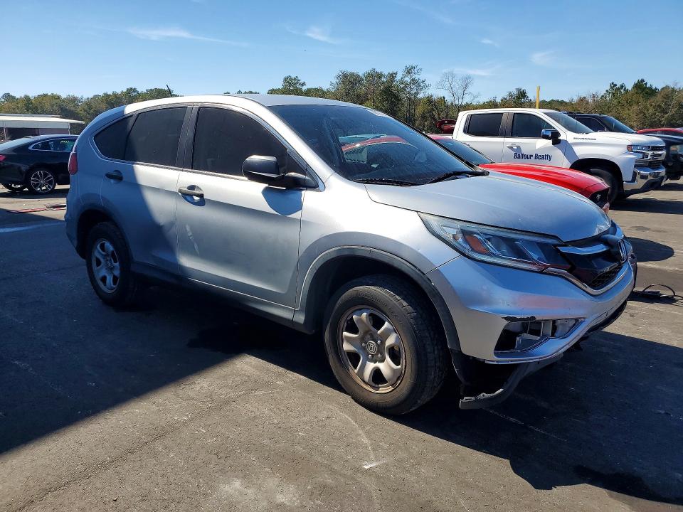 Photo 4 from auction – 2015 HONDA CR-V LX with VIN 5J6RM4H31FL084283