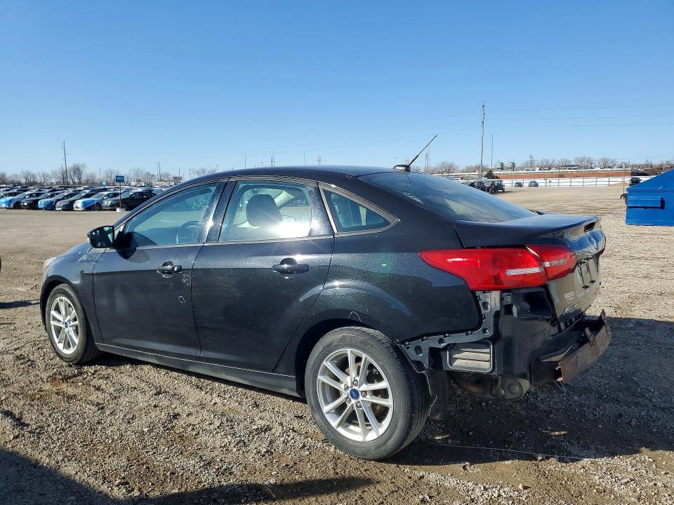 Photo 2 from auction – 2015 FORD FOCUS with VIN 1FADP3F26FL329354