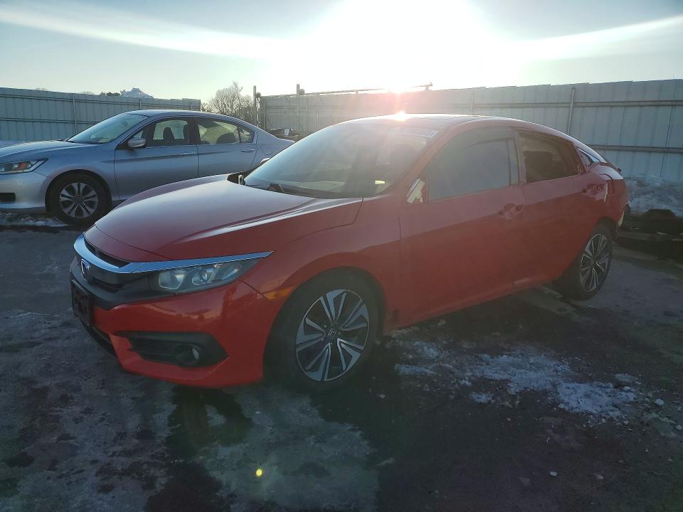 HONDA CIVIC EX 2018 with VIN JHMFC1F34JX010367 - Photo from auction