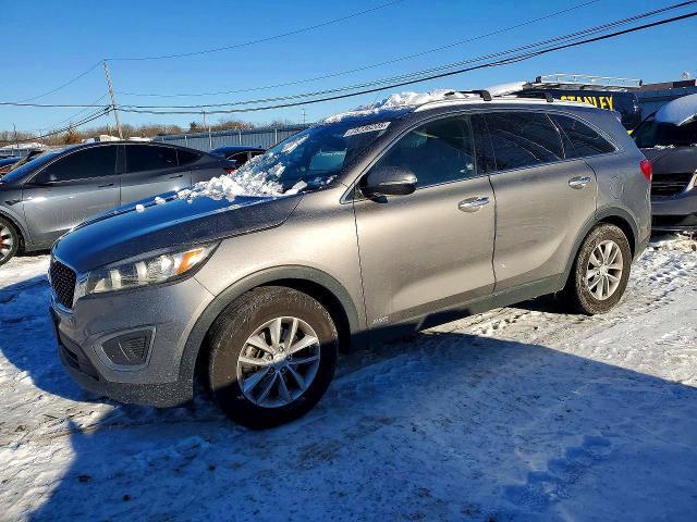 KIA SORENTO 2016 with VIN 5XYPGDA30GG149619 - Photo from auction