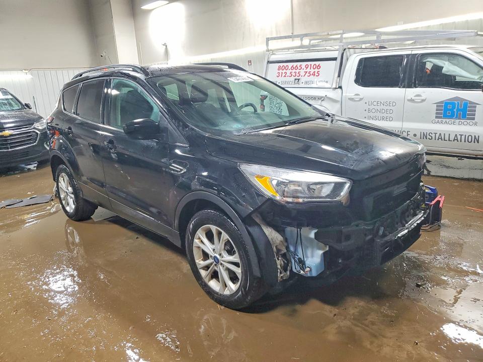 Photo 4 from auction – 2018 FORD ESCAPE with VIN 1FMCU0GD0JUD49403