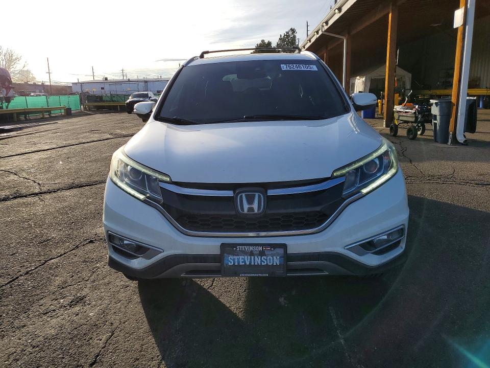 Photo 5 from auction – 2016 HONDA CR-V TOURI with VIN 5J6RM4H96GL091641