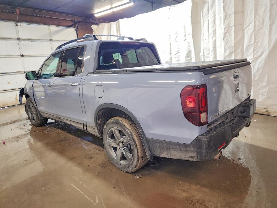 Photo 2 from auction – 2022 HONDA RIDGELINE with VIN 5FPYK3F7XNB019237
