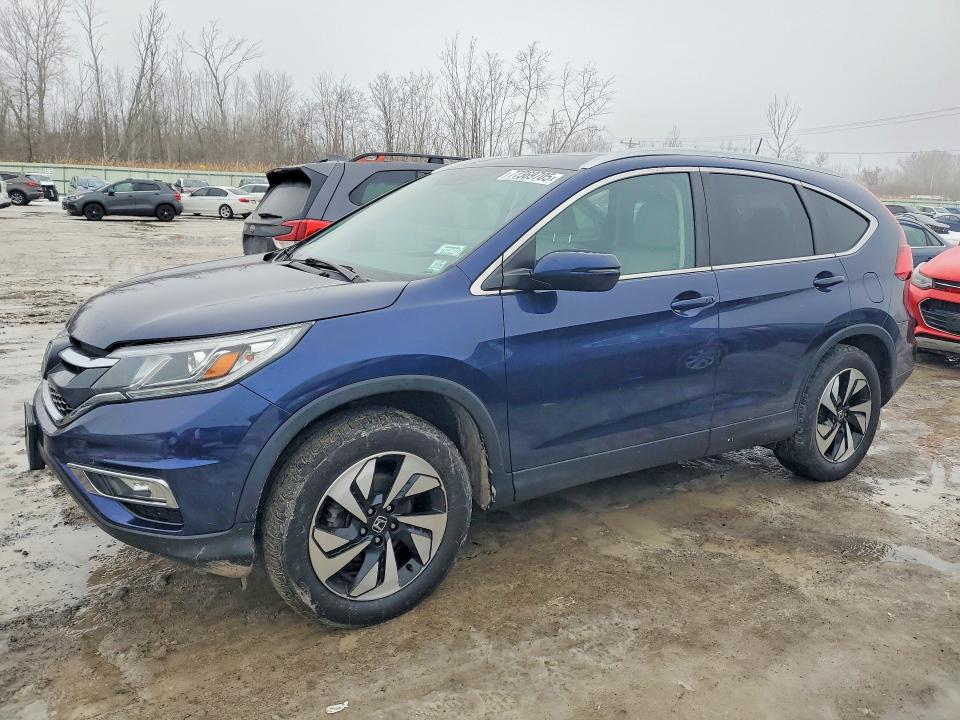 HONDA CR-V 2015 with VIN 5J6RM4H92FL124455 - Photo from auction