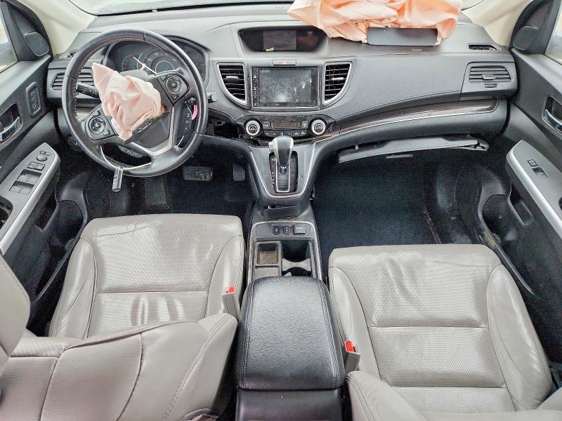 Photo 8 from auction – 2016 HONDA CR-V TOURI with VIN 5J6RM3H94GL016432