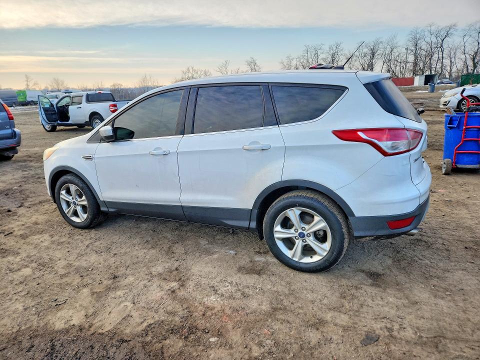 Photo 2 from auction – 2016 FORD ESCAPE with VIN 1FMCU0GX7GUA36111