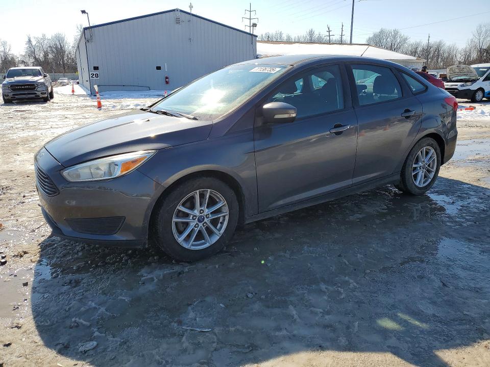 FORD FOCUS 2015 with VIN 1FADP3F23FL346998 - Photo from auction
