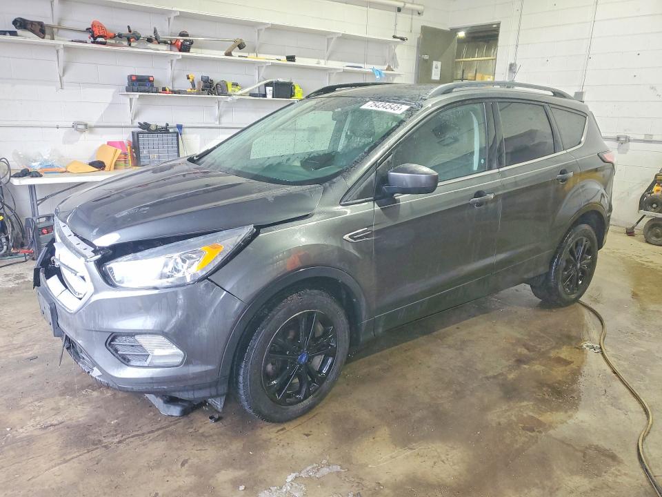 FORD ESCAPE 2018 with VIN 1FMCU0HD7JUC67733 - Photo from auction