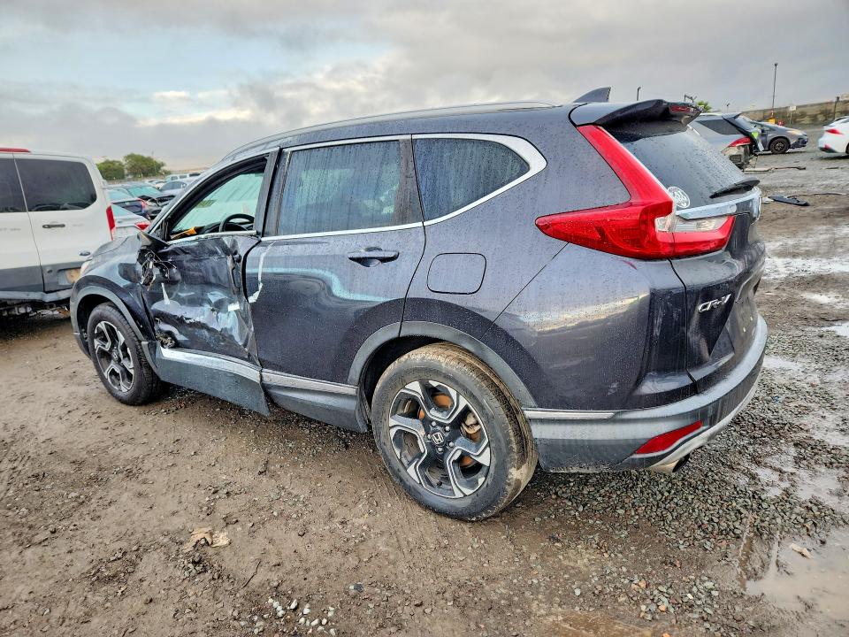 Photo 2 from auction – 2017 HONDA CR-V with VIN 2HKRW1H92HH506961