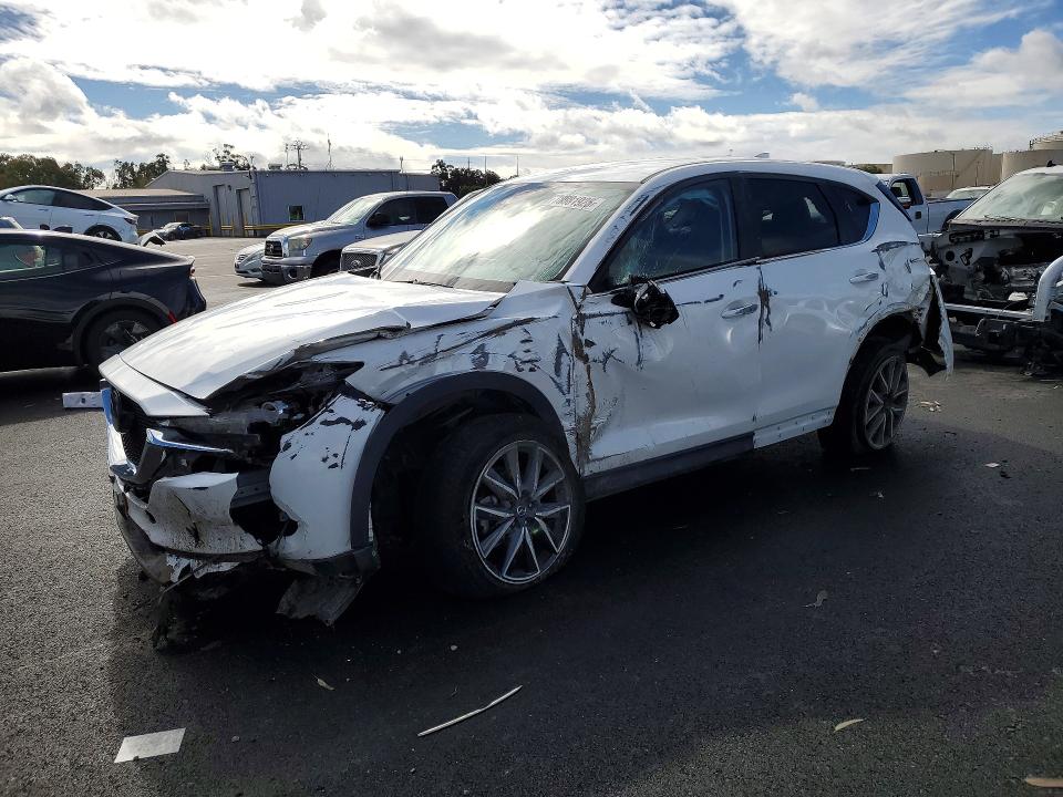 MAZDA CX-5 2018 with VIN JM3KFACM4J0319714 - Photo from auction