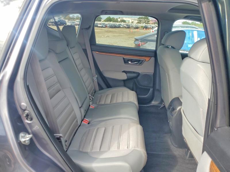 Photo 11 from auction – 2019 HONDA CR-V with VIN 5J6RW1H50KA000342