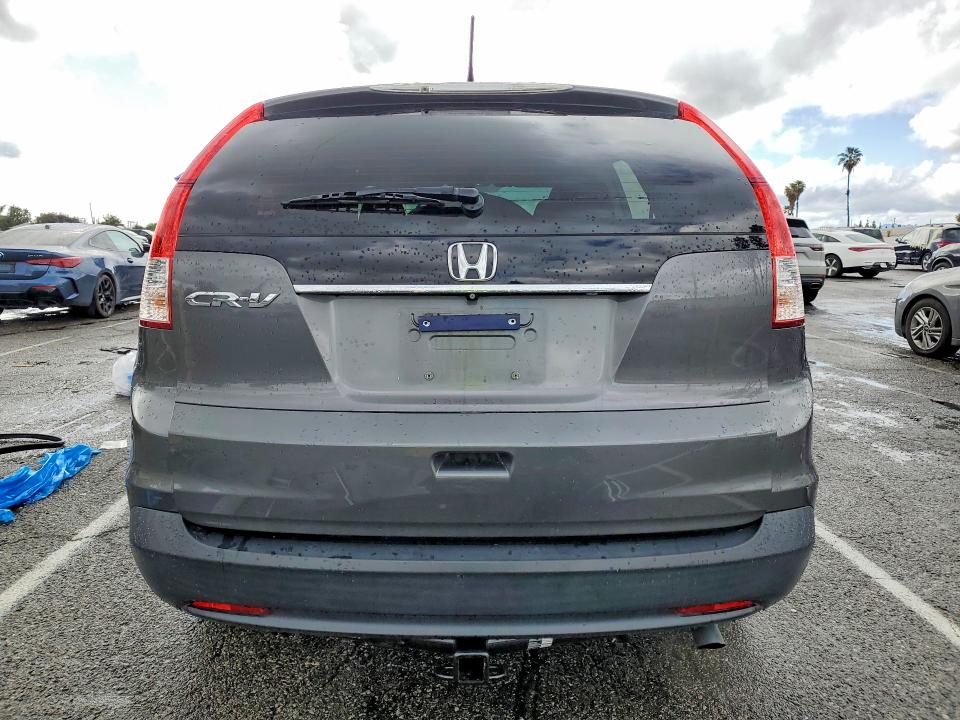 Photo 6 from auction – 2014 HONDA CR-V LX with VIN 2HKRM3H37EH545151