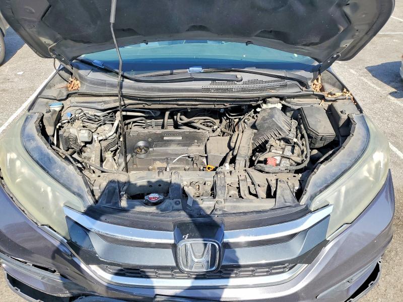 Photo 11 from auction – 2016 HONDA CR-V SE with VIN 2HKRM3H41GH554651