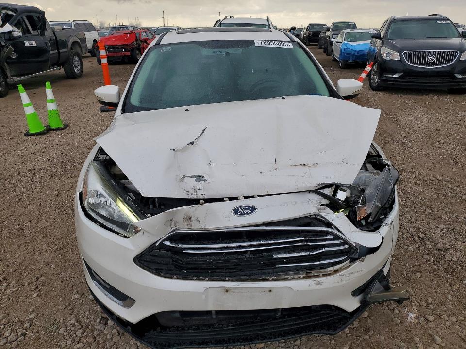 Photo 5 from auction – 2015 FORD FOCUS with VIN 1FADP3N20FL323471