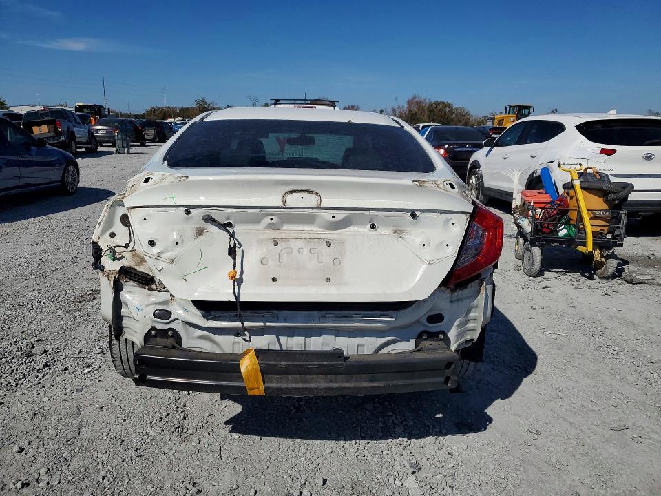 Photo 6 from auction – 2018 HONDA CIVIC LX with VIN 19XFC2F56JE029477