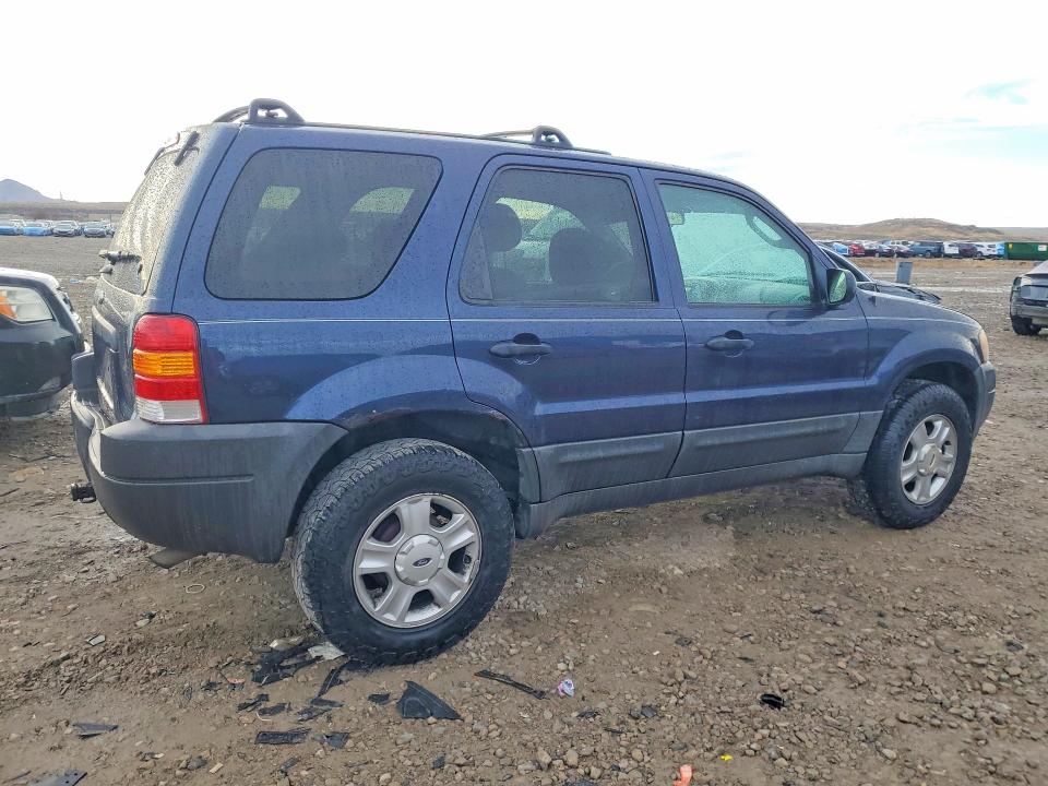 Photo 3 from auction – 2003 FORD ESCAPE with VIN 1FMYU93123KD18819