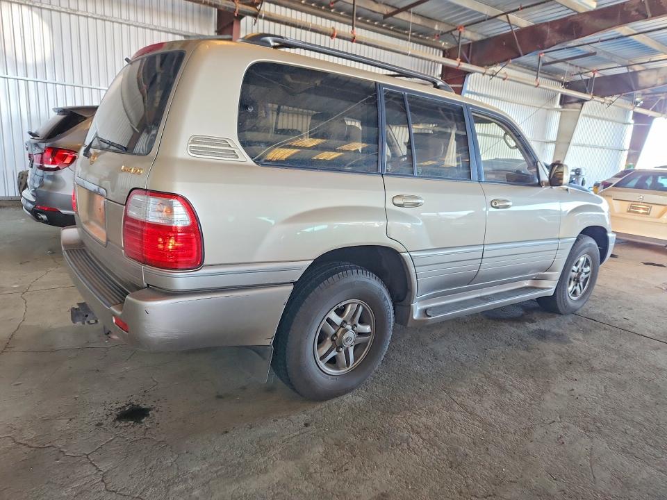 Photo 3 from auction – 1999 LEXUS LX 470 with VIN JT6HT00W9X0063386