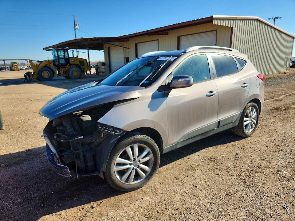 HYUNDAI TUCSON 2010 with VIN KM8JU3AC7AU012803 - Photo from auction
