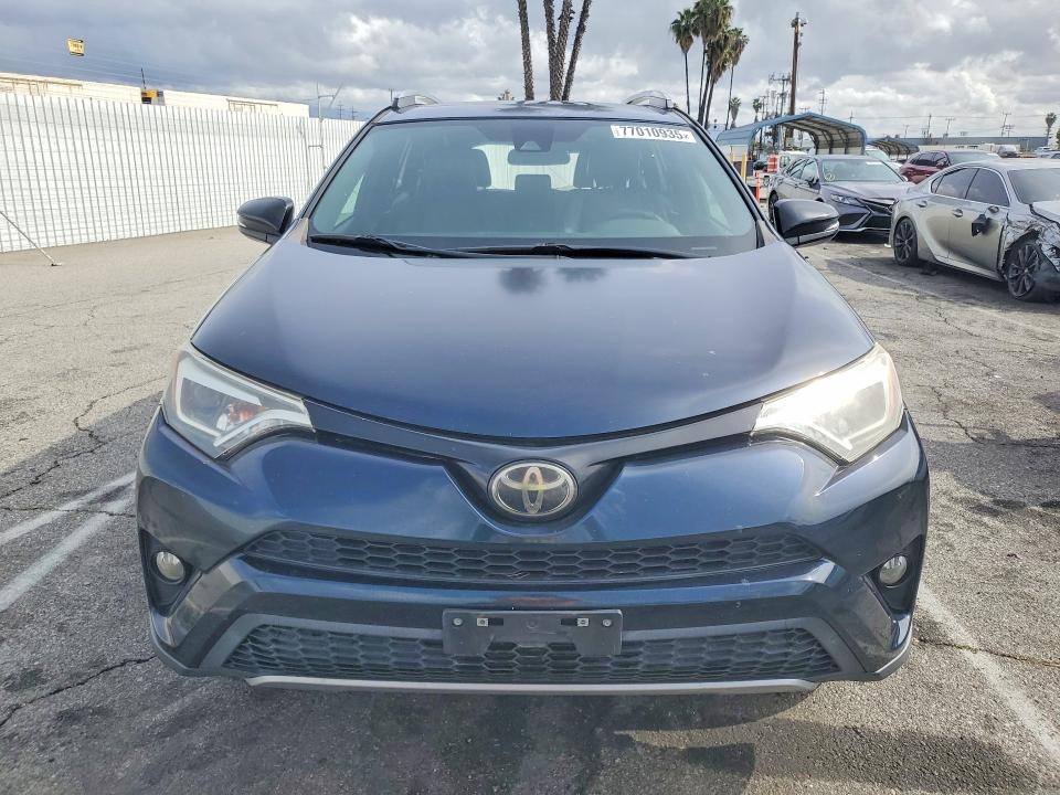 Photo 5 from auction – 2017 TOYOTA RAV4 with VIN 2T3NFREV2HW396145