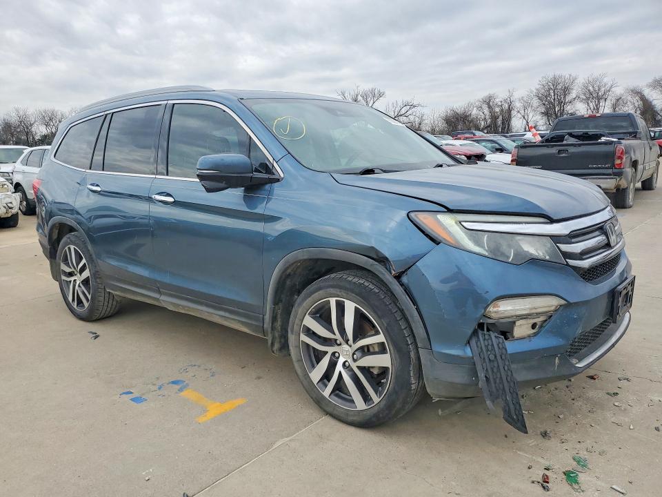 Photo 4 from auction – 2017 HONDA PILOT TOUR with VIN 5FNYF5H99HB022299