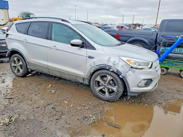 Photo 4 from auction – 2018 FORD ESCAPE with VIN 1FMCU0HDXJUD57734