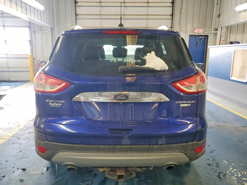 Foto 6 de la subasta – 2015 FORD ESCAPE con VIN 1FMCU9J93FUA50035