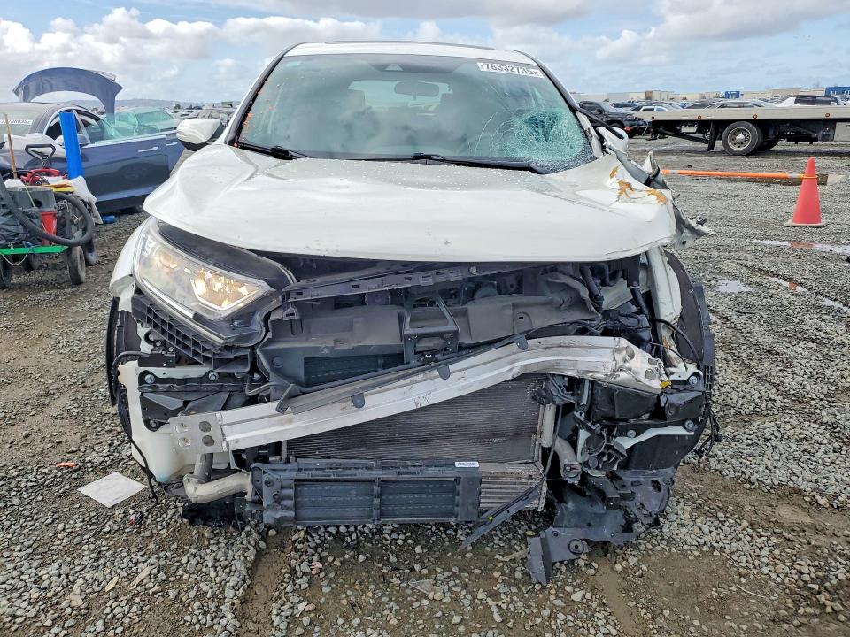 Photo 5 from auction – 2017 HONDA CR-V with VIN 2HKRW1H59HH519381