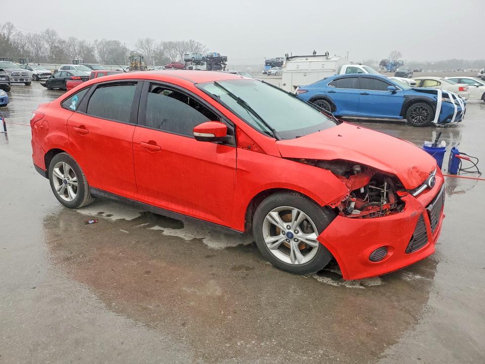 Photo 4 from auction – 2014 FORD FOCUS with VIN 1FADP3F21EL338820