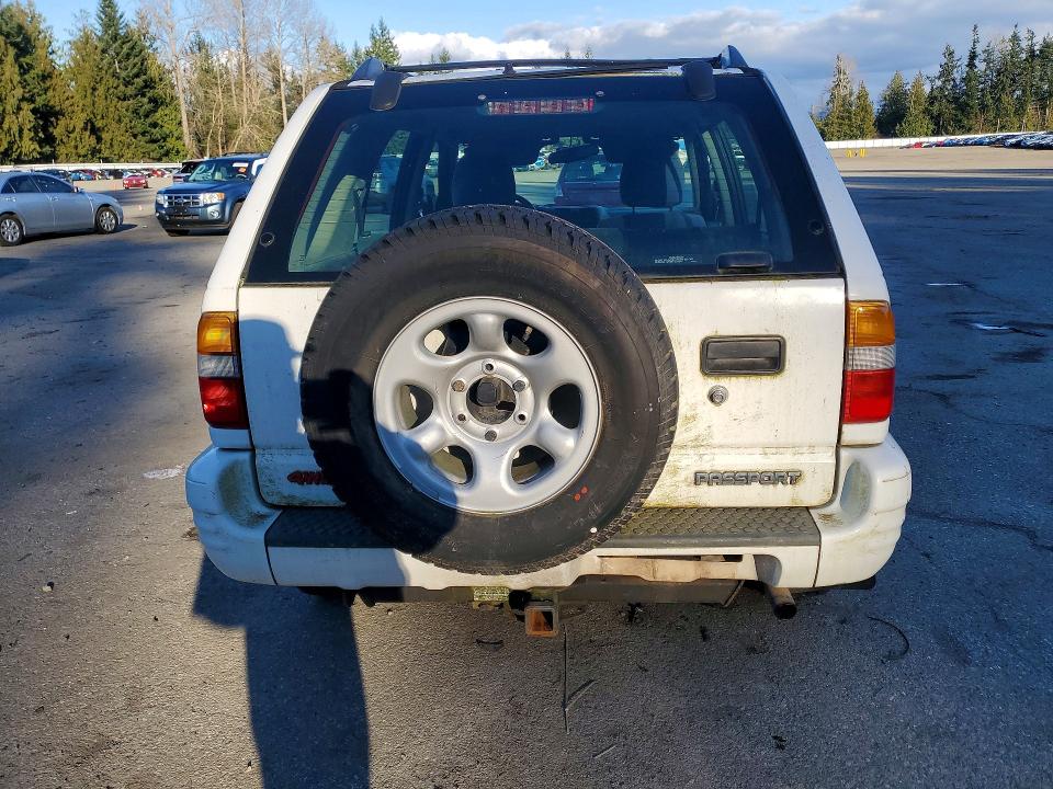 Photo 6 from auction – 2001 HONDA PASSPORT with VIN 4S6DM58WX14404030