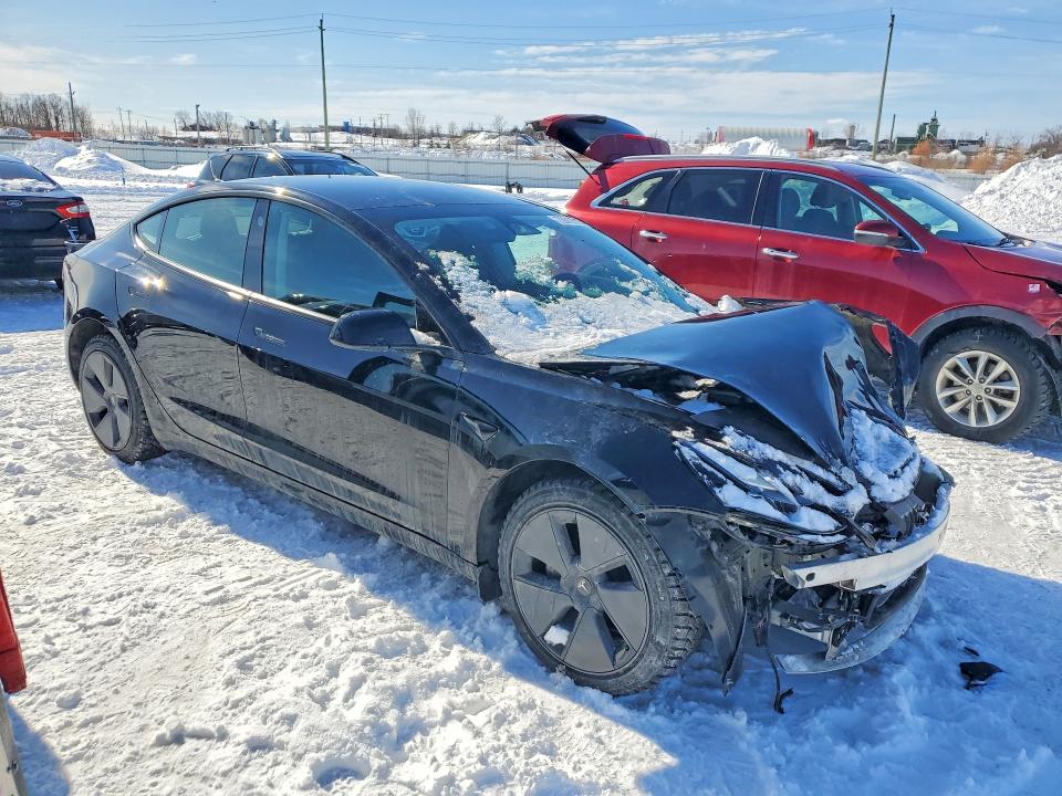 Photo 4 from auction – 2023 TESLA MODEL 3 with VIN LRW3E1FA5PC872684