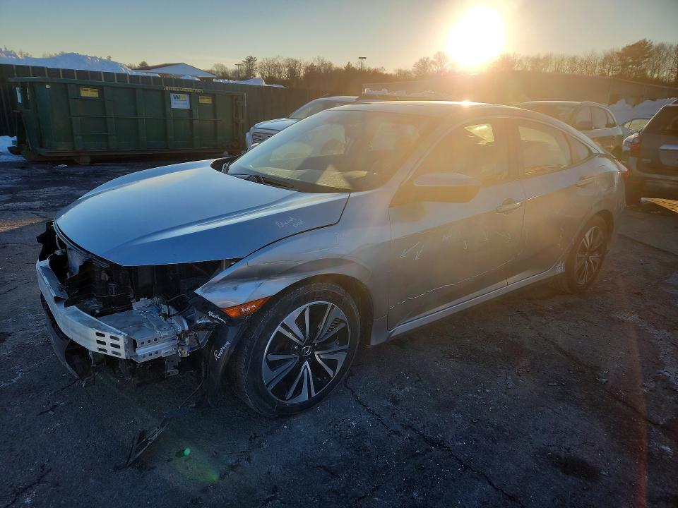 HONDA CIVIC EX 2018 with VIN JHMFC1F85JX043857 - Photo from auction
