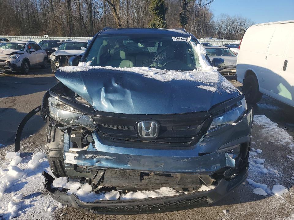 Photo 5 from auction – 2021 HONDA PILOT SE with VIN 5FNYF6H27MB096596