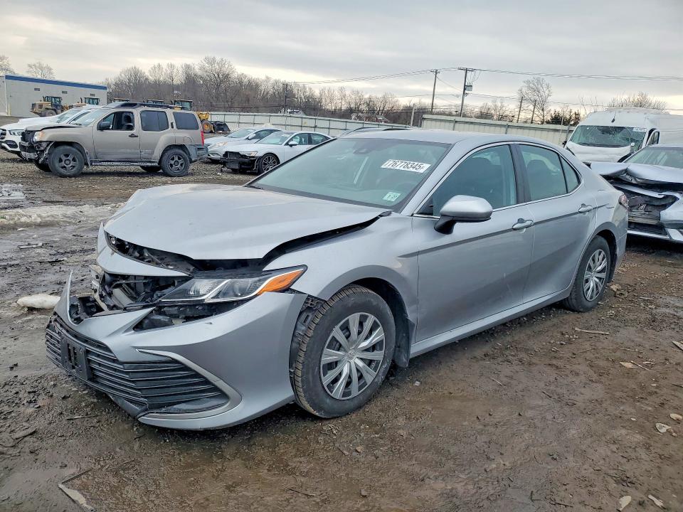 TOYOTA CAMRY 2022 with VIN 4T1C31AK1NU584057 - Photo from auction