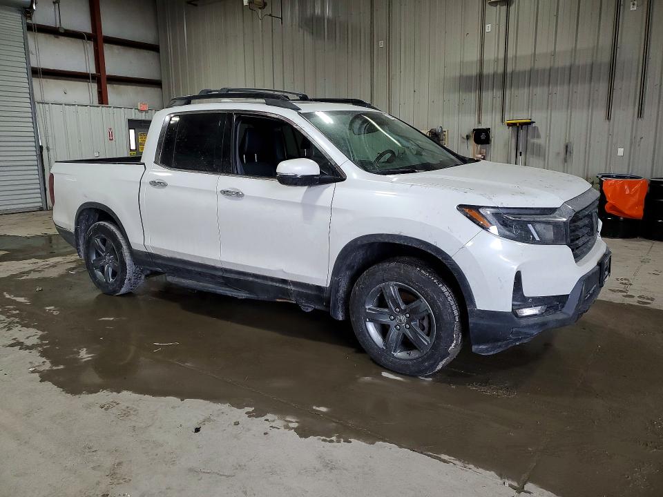 Photo 4 from auction – 2022 HONDA RIDGELINE with VIN 5FPYK3F70NB028528
