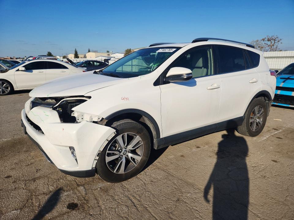 TOYOTA RAV4 XLE 2017 with VIN JTMWFREV3HJ123055 - Photo from auction