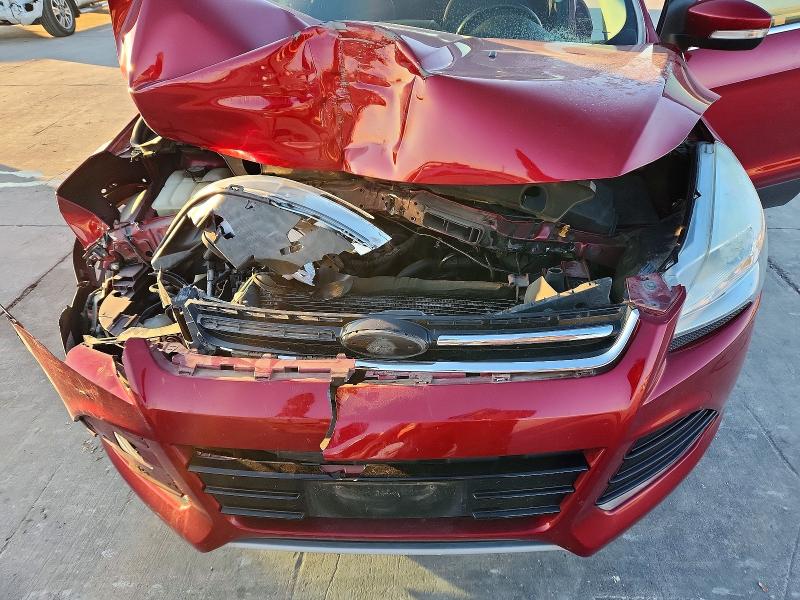 Photo 11 from auction – 2015 FORD ESCAPE with VIN 1FMCU0JX2FUA51557