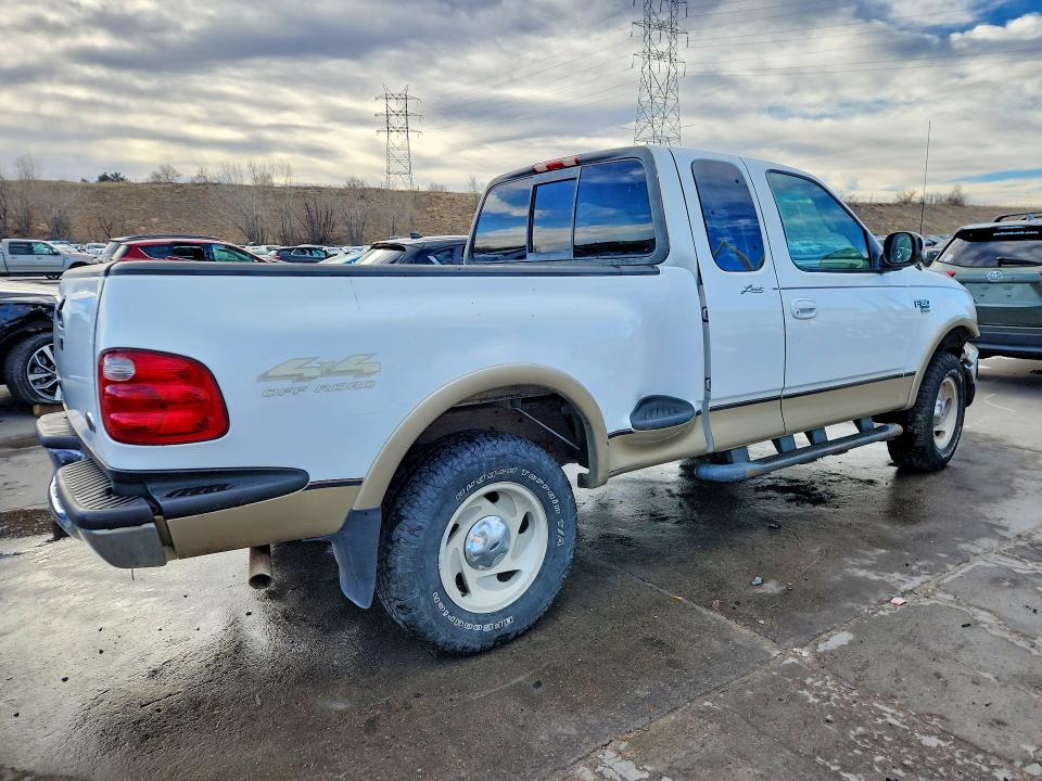 Photo 3 from auction – 2000 FORD F150 with VIN 2FTRX08L1YCB14479