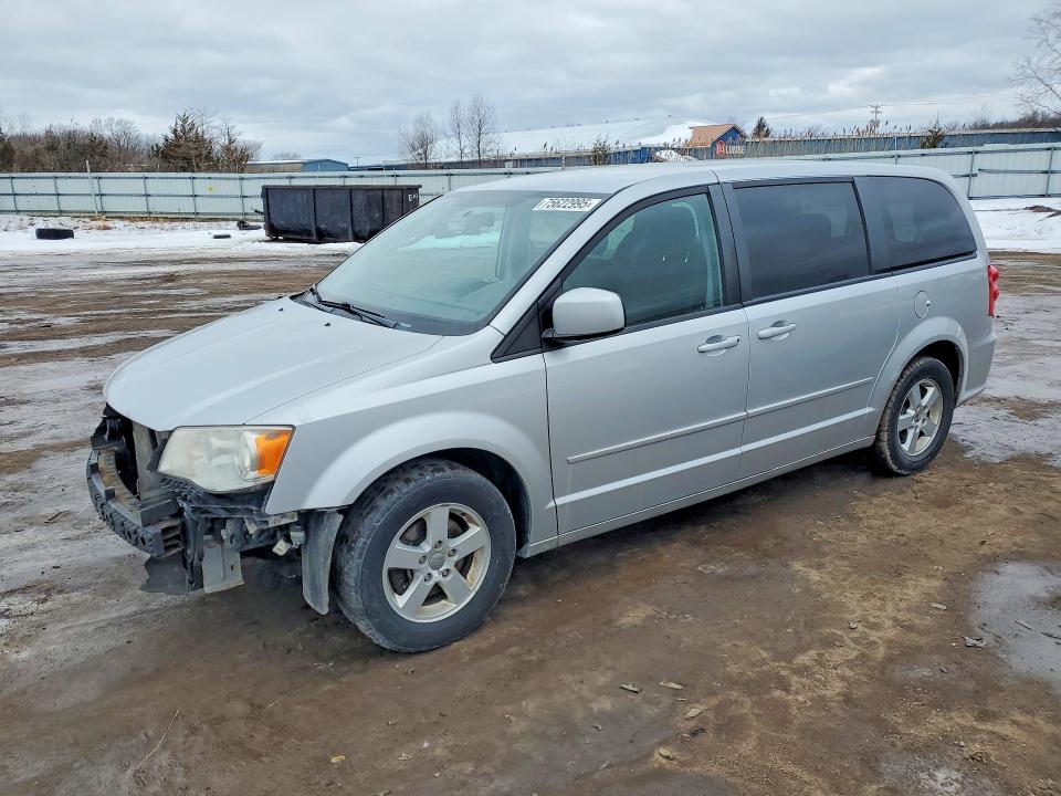 DODGE GRAND CARA 2011 with VIN 2D4RN3DG2BR658884 - Photo from auction