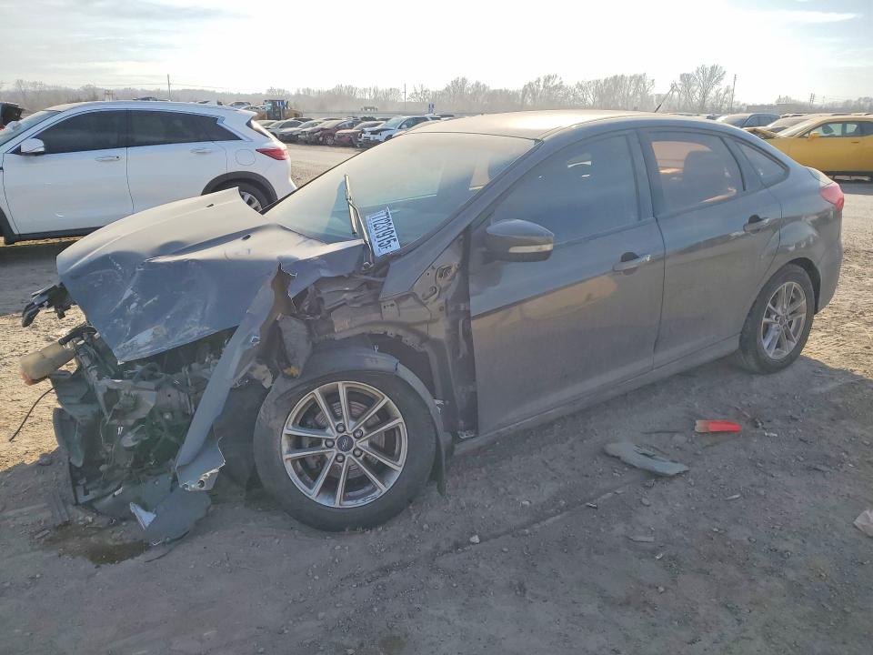 FORD FOCUS 2015 with VIN 1FADP3F21FL379708 - Photo from auction