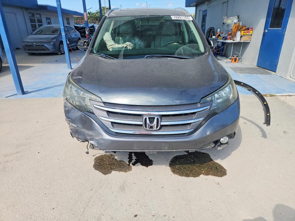Photo 5 from auction – 2014 HONDA CR-V with VIN 2HKRM3H74EH510554
