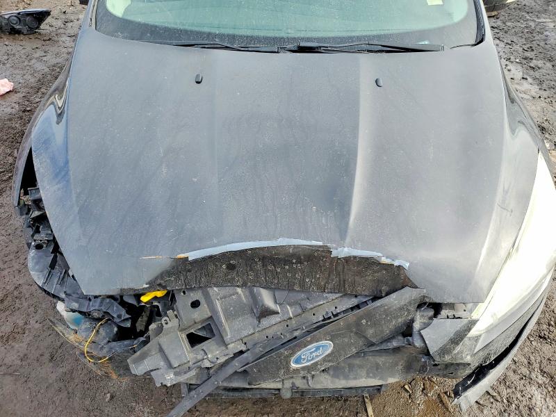 Photo 11 from auction – 2015 FORD FOCUS with VIN 1FADP3N20FL230143