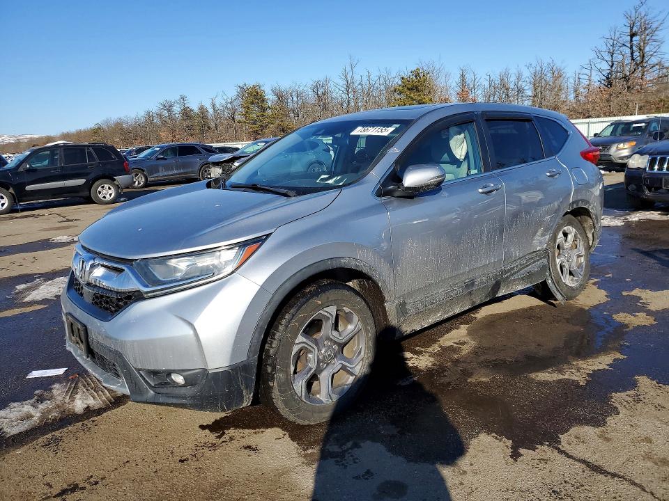 HONDA CR-V EX 2018 with VIN 7FARW2H54JE060131 - Photo from auction