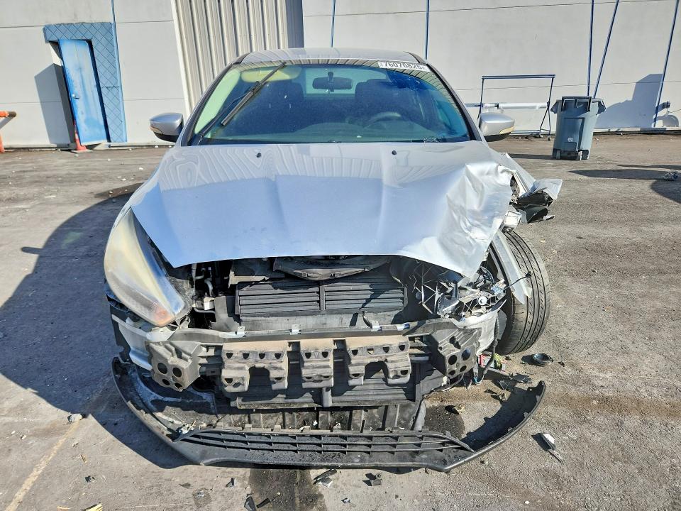 Photo 5 from auction – 2016 FORD FOCUS with VIN 1FADP3F24GL224068